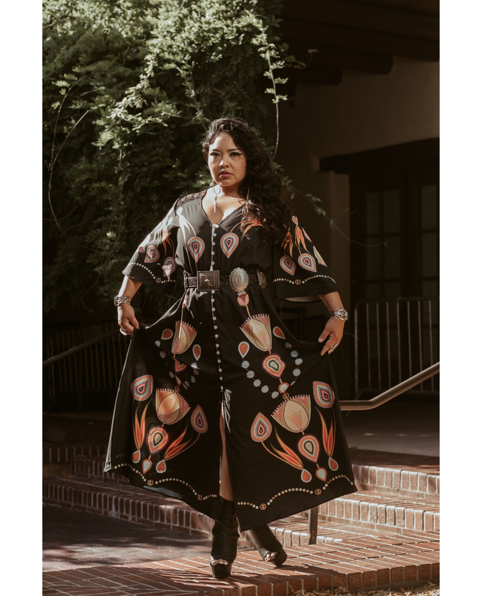  Diné powerlifter Monica Chaffin dressed by Jamie Okuma at the 100th Annual Santa Fe Indian Fashion Show