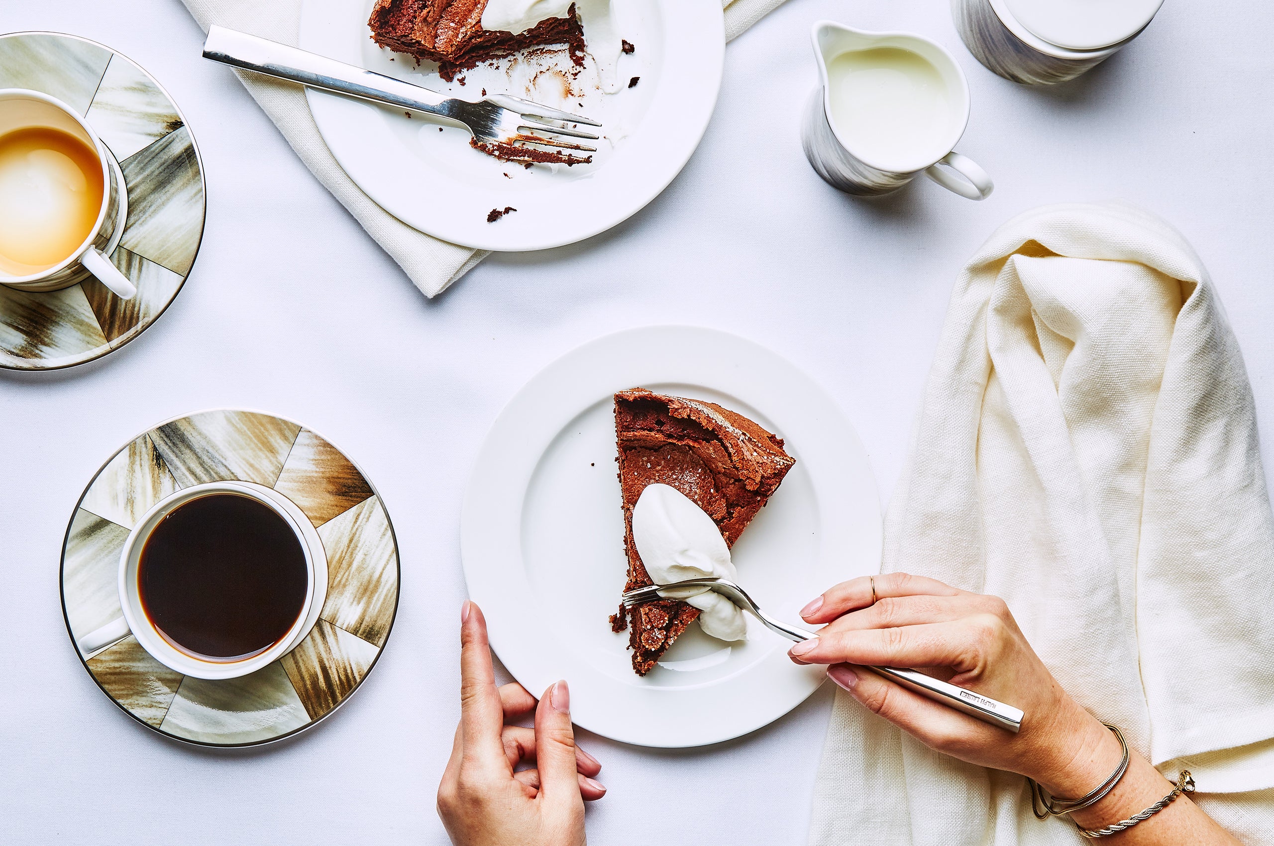  Gwyneth horn cup and saucer, Academy flatware