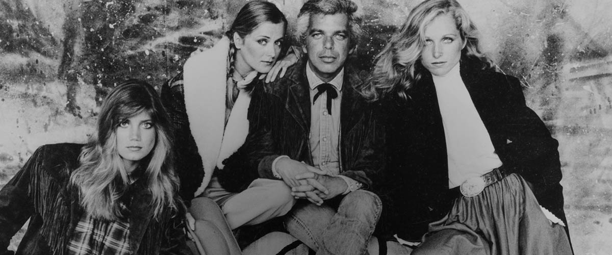 Black & white photo of Ralph Lauren in sport coat & jeans