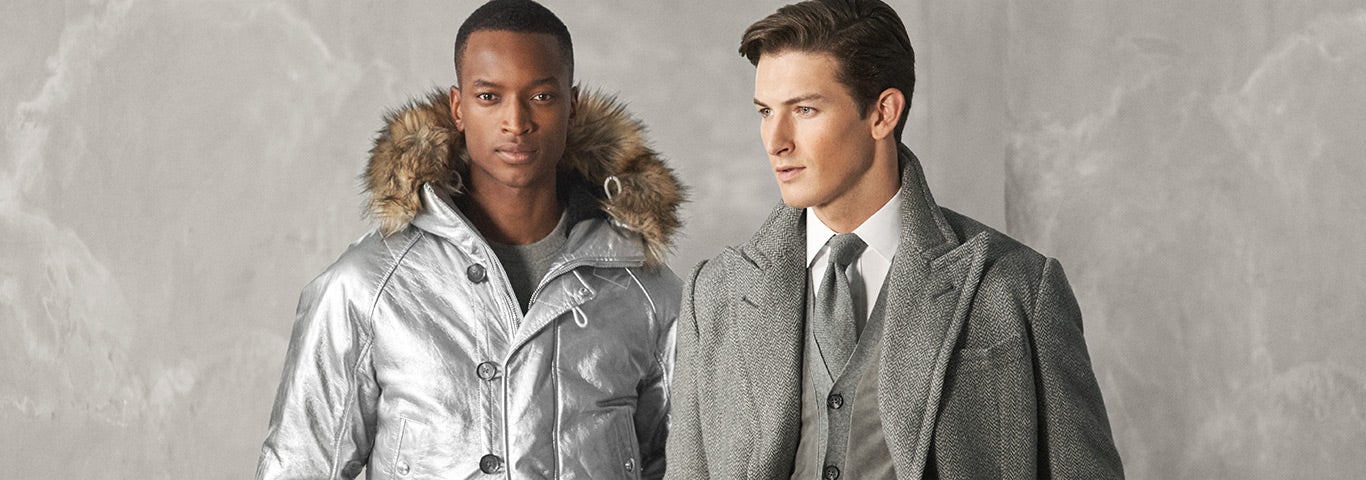 Man in faux-fur-trim silver parka & man in grey peacoat