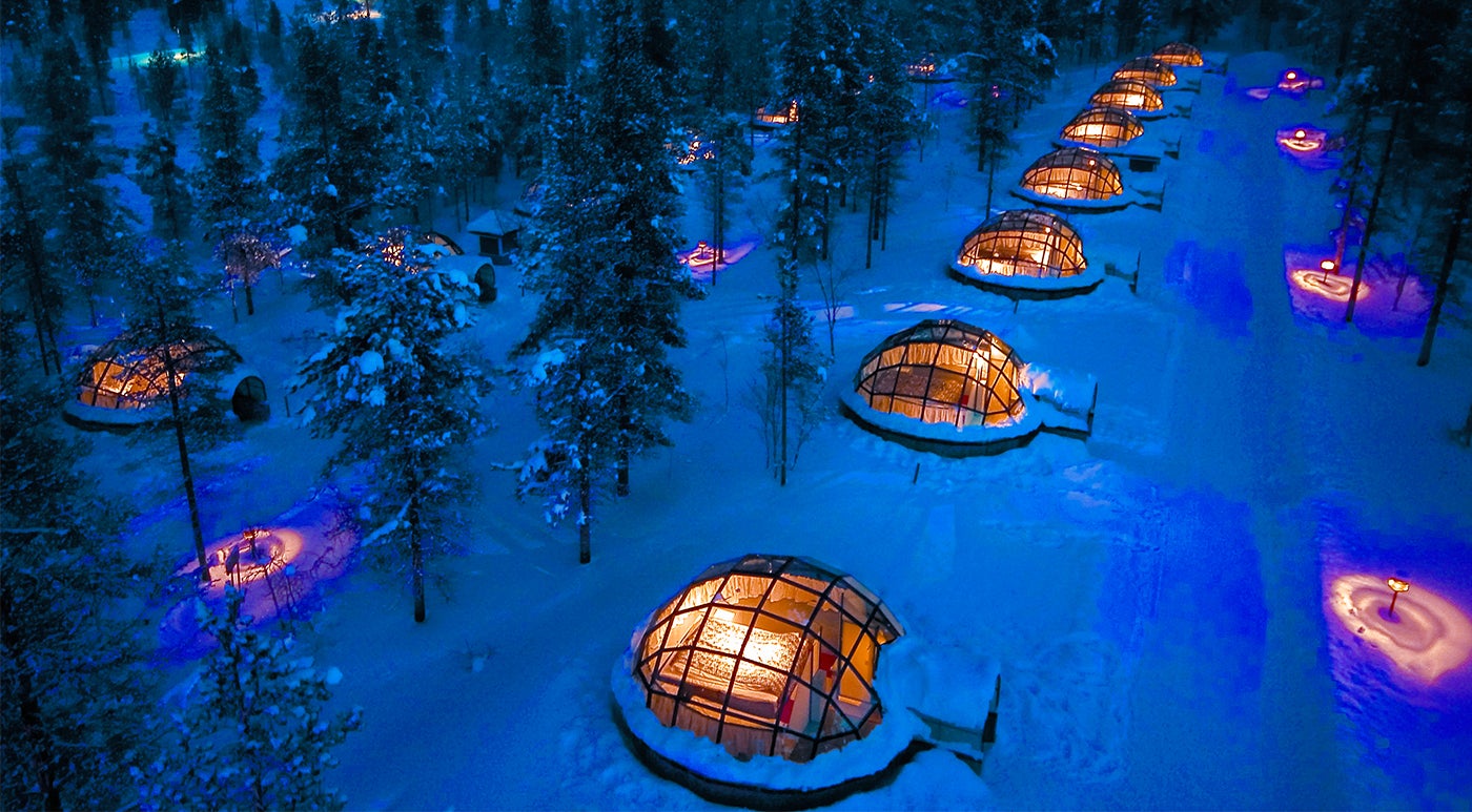 Kakslauttanen's glass igloos offer sweeping views of the night sky. 
