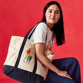 Patti Harrison in white tee with large rainbow Polo Pony graphic