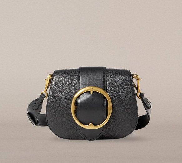 Black pebbled leather shoulder bag with large buckle at front