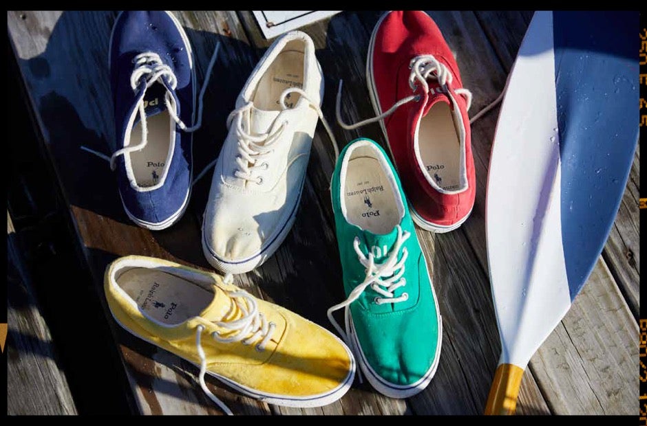 Colorful canvas lace-up sneakers on dock