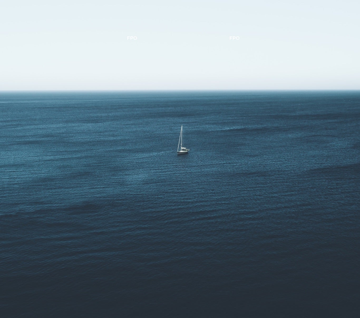 Aerial photograph of sailboat in ocean