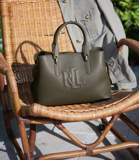 Olive satchel with embossed LRL monogram at front.